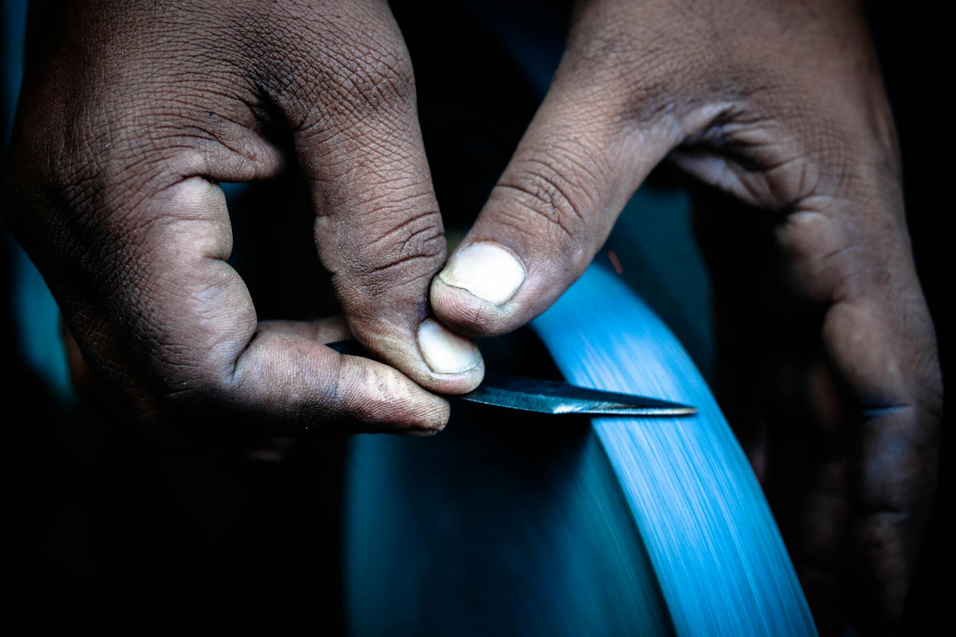 Photo by Raghav Modi: https://www.pexels.com/photo/person-sharpening-knife-3893792/